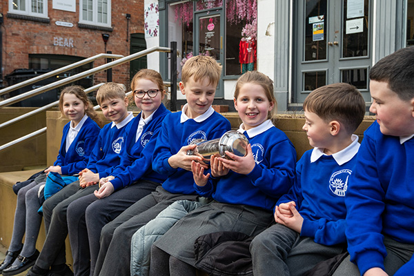 ASHBOURNE SCHOOL CHILDREN PLACE TIME CAPSULE IN TRANSFORMED MILLENNIUM SQUARE