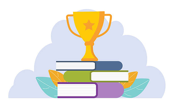 Golden trophy cup standing on the books. Business goal, idea. Victory concept