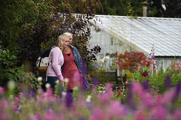 Visitors in the garden at Gunby Hall, Lincolnshire