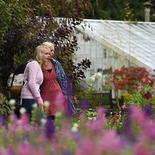 Visitors in the garden at Gunby Hall, Lincolnshire