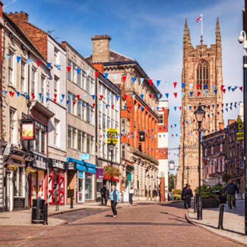 3 October 2016: Derby, England, UK - People shopping in Iron Gate in the centre of the city.