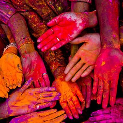 Holi festival in India with colorful hands