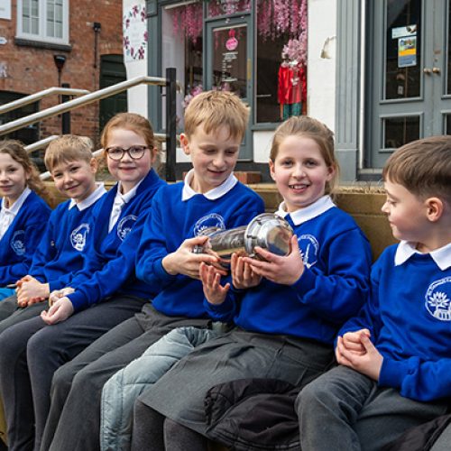 ASHBOURNE SCHOOL CHILDREN PLACE TIME CAPSULE IN TRANSFORMED MILLENNIUM SQUARE